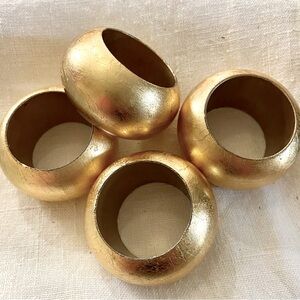 Set a four gold napkin rings. 2 1/2”